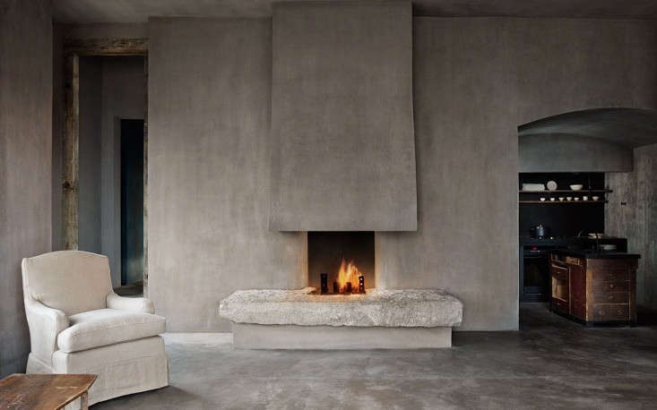 a limewashed wall in a room by axel vervoordt. see more of the belgian design  17