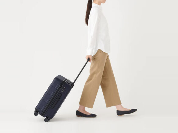 muji adjustable handle hard shell suitcase  